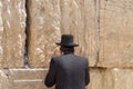 Orthodox jewish man pray at the Western Wall. Jerusalem