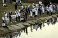 Orthodox Jewish pilgrims pray on the bank of lake near the tomb of Rabbi Nachman while celebrating Rosh Hashanah, Jewish