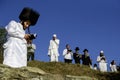 Orthodox Jewish pilgrims pray on the bank of lake near the tomb of Rabbi Nachman while celebrating Rosh Hashanah, Jewish