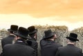 Orthodox Jewish prays, jews, judaism, hasidim, back, behind Royalty Free Stock Photo