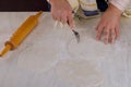 Orthodox Jews rolling dough for Matzos for Passover to putting in oven