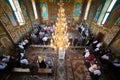 Orthodox liturgy in a church in Romania