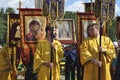 Orthodox men in vestments on street prayer