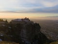 Orthodox monastery on the rock. Sunrise in autumn.