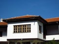 Orthodox monastery white buildings against blue sky. Century old monastery premises.