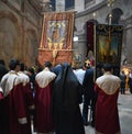 Orthodox pilgrims holding jesus christ cross visit the holy city of Jerusalem during christmas