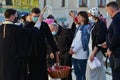 An Orthodox priest blesses Orthodox believers on the eve of Orthodox Easter
