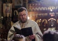 Orthodox priest reading in church