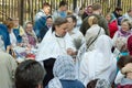 An Orthodox priest sprinkles Christians with Holy water and illuminates the traditional. Great religious holiday in Moscow