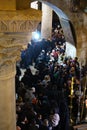 Orthodox priests and pilgrims in The Church of the Holy Sepulchre Royalty Free Stock Photo