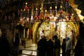 Orthodox priests and pilgrims in The Church of the Holy Sepulchre Royalty Free Stock Photo