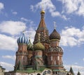 Orthodox red square church colorful domes with blue sky at background