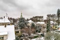 Orthodox russian church in Strasbourg, city roofs after snowfall Royalty Free Stock Photo