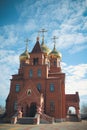 Orthodox Russian temple with golden domes in spring Royalty Free Stock Photo