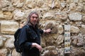 Orthodox Serbian Christians pilgrim mark Good Friday in Jerusalem along the Via Dolorosa.