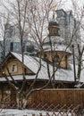 Orthodox tree Russian church covered with snow. Wooden Church Before Christmas