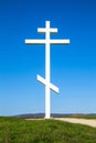 A wooden cross on top of a hill Royalty Free Stock Photo