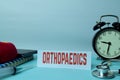 Orthopaedics Planning on Background of Working Table with Office Supplies Royalty Free Stock Photo