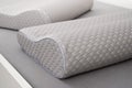 Orthopedic foam pillow with memory effect