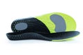 Orthopedic insoles for athletic shoes