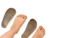 Orthopedic insoles and legs Royalty Free Stock Photo