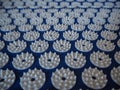 Orthopedic massage blue mat with white spikes. Close-up view. Alternative medicine for babies, kids and adults