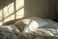 an orthopedic pillow on a wellmade bed, morning sunlight streaming
