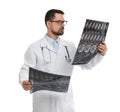 Orthopedist holding X-ray pictures on background Royalty Free Stock Photo