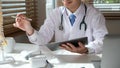 Orthopedist uses tablet at workplace