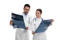 Orthopedists holding X-ray pictures on background