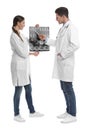 Orthopedists working with X-ray picture on background