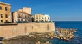 Ortigia island of Syracuse old town along Lungomare d\'Ortigia with Forte Vigliena fortress at Ionian sea in Sicily in Italy