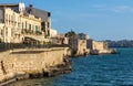 Ortigia island of Syracuse old town shore at Ionian sea along Lungomare Alfeo and Castello Maniace fortress in Sicily in Italy