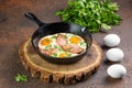 ortioned baked eggs in ceramic cocotte with Different delicious egg recipes Royalty Free Stock Photo