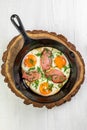 ortioned baked eggs in ceramic cocotte with Different delicious egg recipes Royalty Free Stock Photo