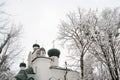 Ortodox slavic church in a winter time over grey sky background.