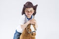 Ortrait of Happy Smiling and Glad Caucasian Little Boy in Cowboy Clothing