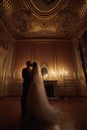 Ortrait of a romantic couple, silhouette, couple of lovers groom and bride at interior in the Baroque style. Romantic