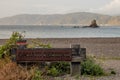 Oruaiti Reserve entrance sign on edge of beach