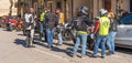 Masked and unmasked traveling bikers who stop to eat in Italian Borgo Orvinio during second wave of coronavirus Covid19, Italy