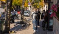 Masked and unmasked traveling bikers who stop to eat in Italian Borgo Orvinio during second wave of coronavirus Covid19, Italy