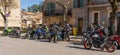 Masked and unmasked traveling bikers who stop to eat in Italian Borgo Orvinio during second wave of coronavirus Covid19, Italy