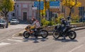 Masked and unmasked traveling bikers who stop to eat in Italian Borgo Orvinio during second wave of coronavirus Covid19, Italy