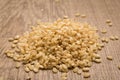 Whole Short Grain Rice Seed. Pile of grains on the wooden table. Royalty Free Stock Photo