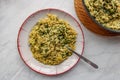 Orzo pasta vith green vegetables. Vegetarian creamy orzo cooked rissoto style Royalty Free Stock Photo