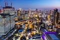 Osaka big city lights from above skyline with skyscraper at twilight in Japan Royalty Free Stock Photo