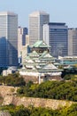 Osaka Castle from above skyline with skyscraper portrait format in Japan