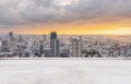 Osaka city skyline, downtown business district in sunset with concrete floor