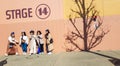 Osaka, Japan on April 9, 2019. Five Asian best friends are taking pictures in front of the Stage 14 studio facade at Universal