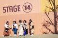 Osaka, Japan on April 9, 2019. Five Asian best friends are taking pictures in front of the Stage 14 studio facade at Universal